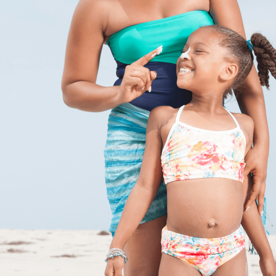 Mother & Child In Bathing Suite